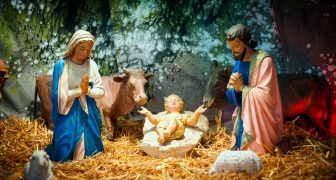 Christmas nativity scene with baby Jesus, Mary & Joseph in barn