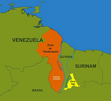 Guayana Esequiba en Naranja y la Región del Tigri en Amarillo, ambos territorios ocupados ilegalmente por Guyana, en el caso del Tigri mantienen una base militar