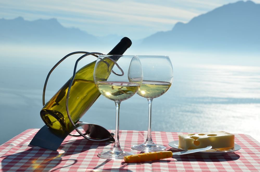 Wine and cheese against Geneva lake, Switzerland