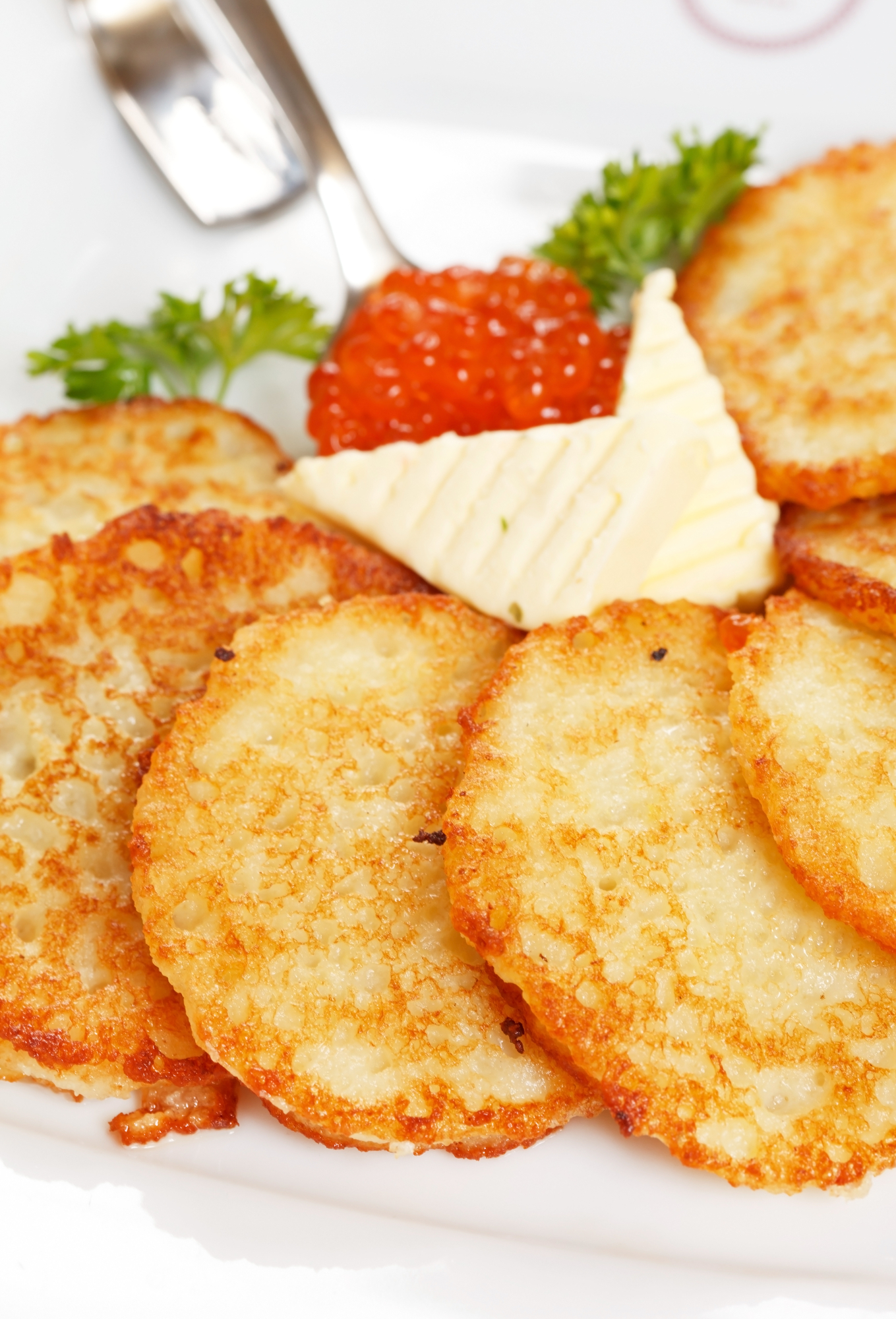 fried potatoes pancakes with caviar