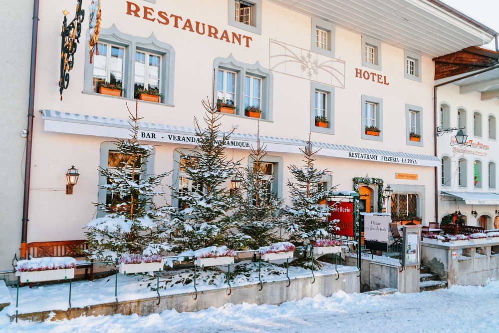 Cozy restaurant in the swiss village Gruyeres, Switzerland.
