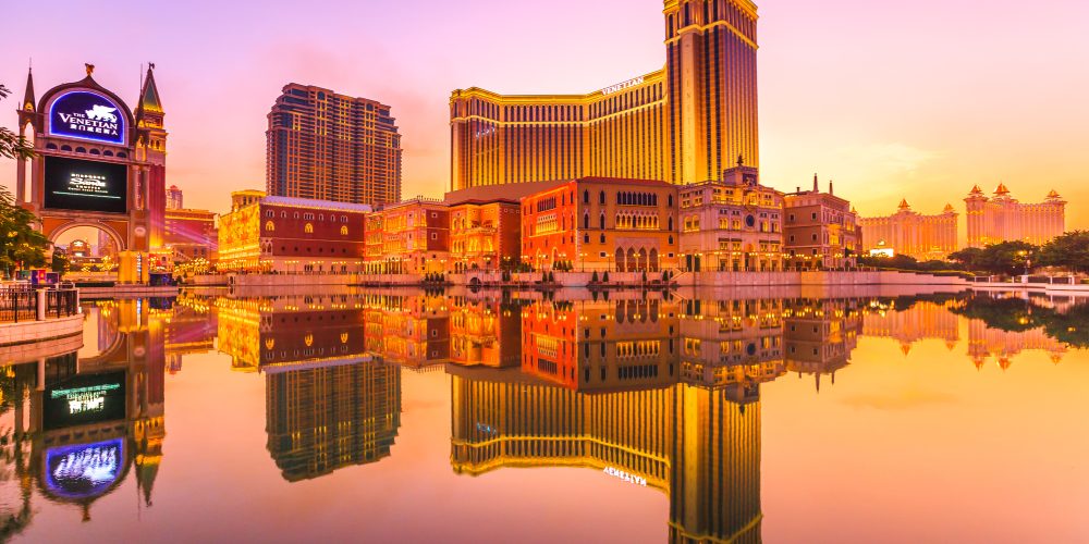 Macau, China, The Venetian Macao Sunset reflecting in the lake. The largest casino in the world.