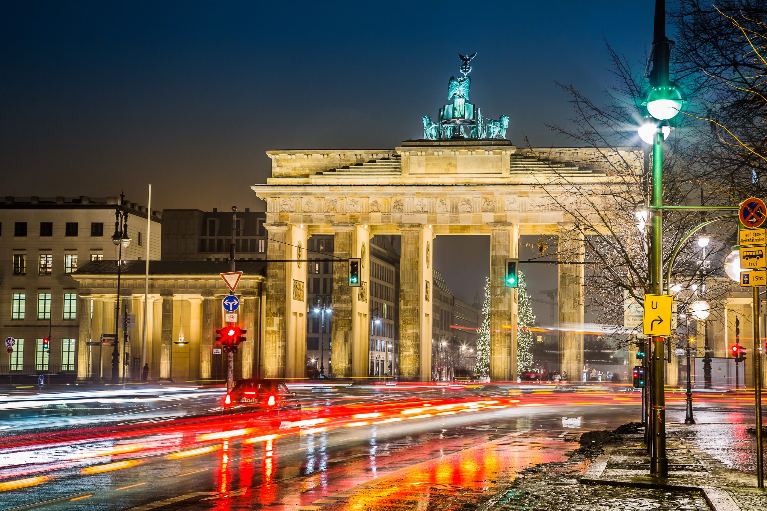 BRANDENBURG GATE, Berlin, Germany at night. Road side view