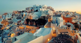 Santorini skyline sunrise with buildings in Greece.