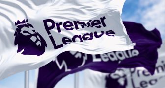 Three Premier League flags waving in the wind