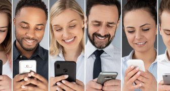 Business people use cell phones. The concept of new technologies.