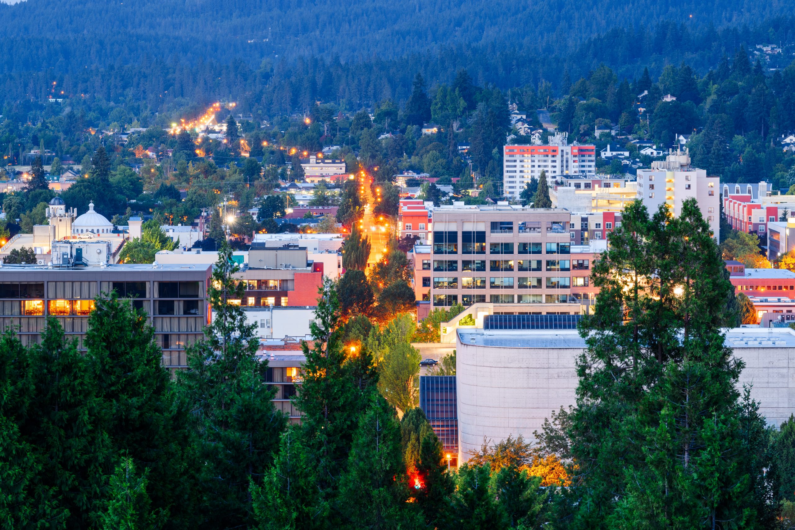 Eugene, Oregon, USA downtown cityscape at dusk.